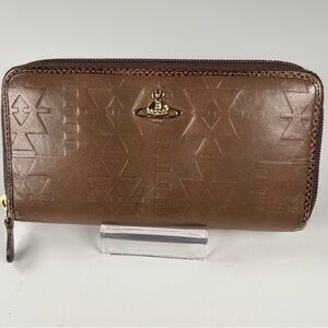 Vivian Westwood wallet. Brown coated embossed leather.